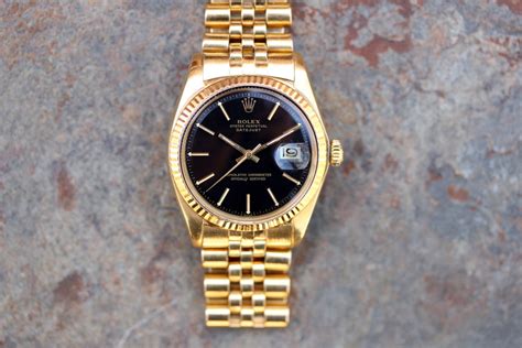 rolex datejust yellow gold black dial